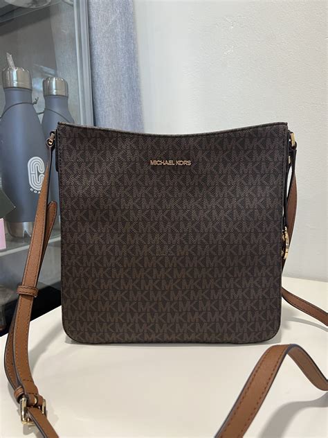 michael michael kors jet set travel large messenger brown|jet set traveling messenger.